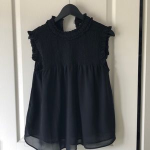 ASOS Black sleeveless top.